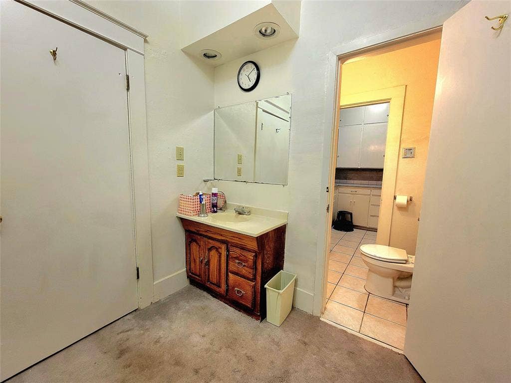 1835 S 7th Street, Abilene, TX 79602 1st floor - Primary bathroom with entry from dressing area and from laundry room