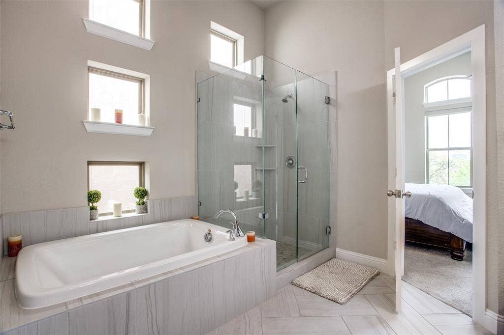 1376 Arch Place, Dallas, TX 75215 Primary bathroom with garden tub and stand alone shower