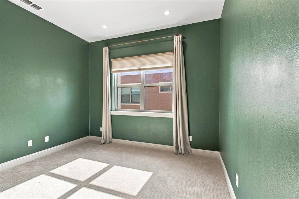 Secondary room on third level could be used as bedroom, office, exercise room
