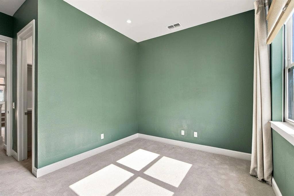Secondary room on third level could be used as bedroom, office or exercise room
