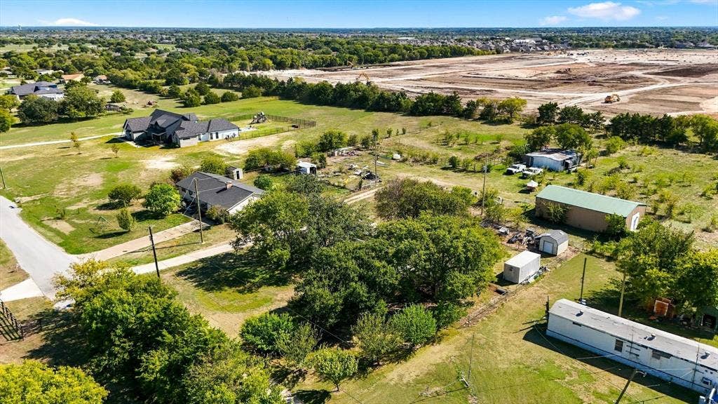1320 Apple Lane, Midlothian, TX 76065 Expansive lot featuring mature trees, a detached multi-purpose storage structure, and open space