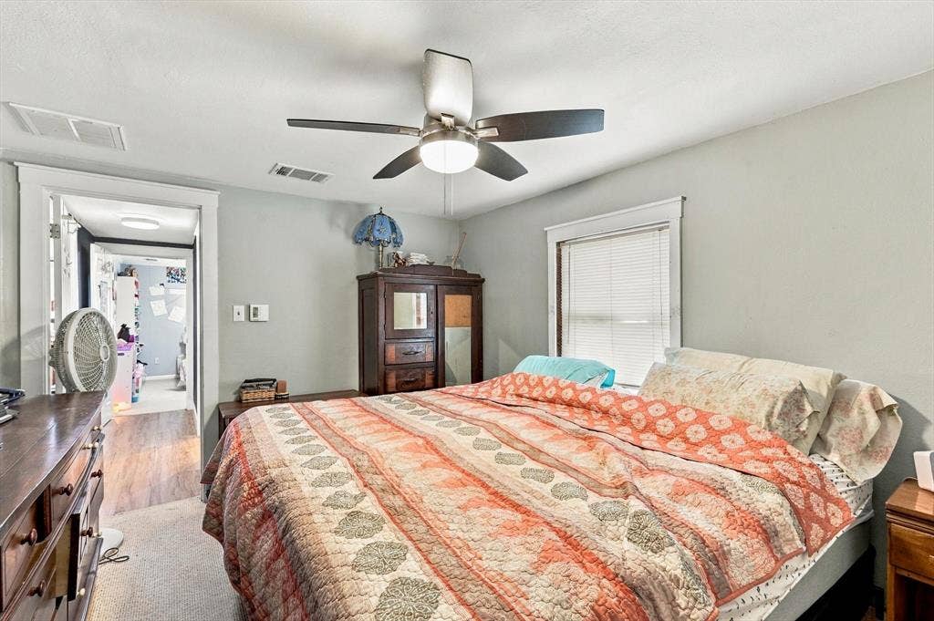1320 Apple Lane, Midlothian, TX 76065 Room featuring neutral wall paint, a satin-finish ceiling fan with integrated lighting, and white window casing