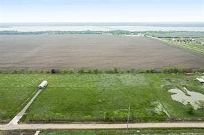 Lot 3 Bozek Lane, Ennis, TX 75119 Expansive land with varied terrain, including cultivated fields and green pastures