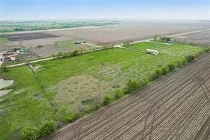 Lot 3 Bozek Lane, Ennis, TX 75119 Expansive rural property featuring cultivated fields and a large open green space