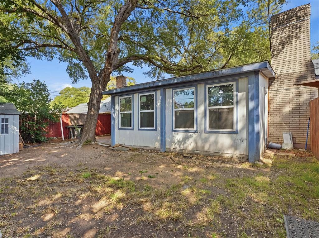 1402 Addington Street, Irving, TX 75062 Exterior structure with multiple windows