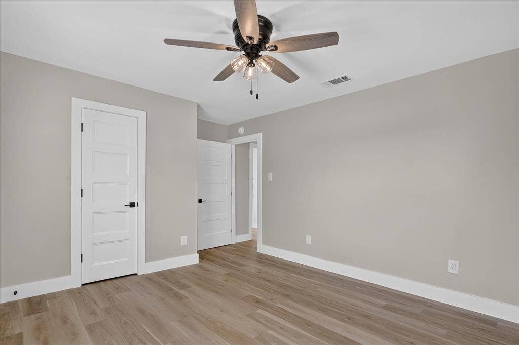 Wood-finish flooring with crisp white trim