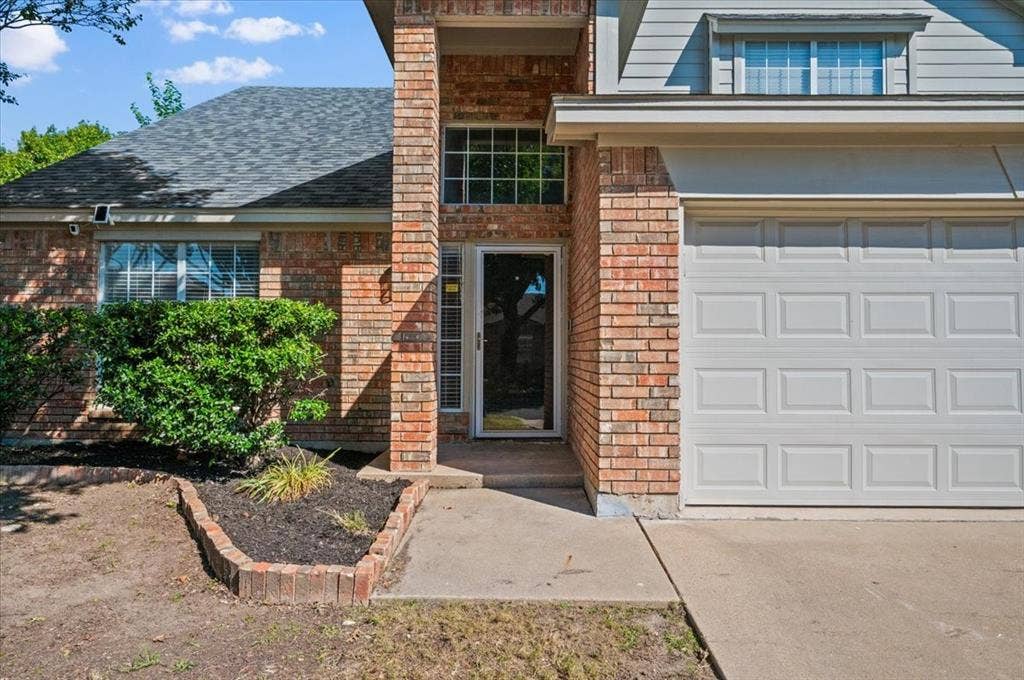 5016 Mill Creek Trail, Fort Worth, TX 76179 Brick exterior with gray siding accents