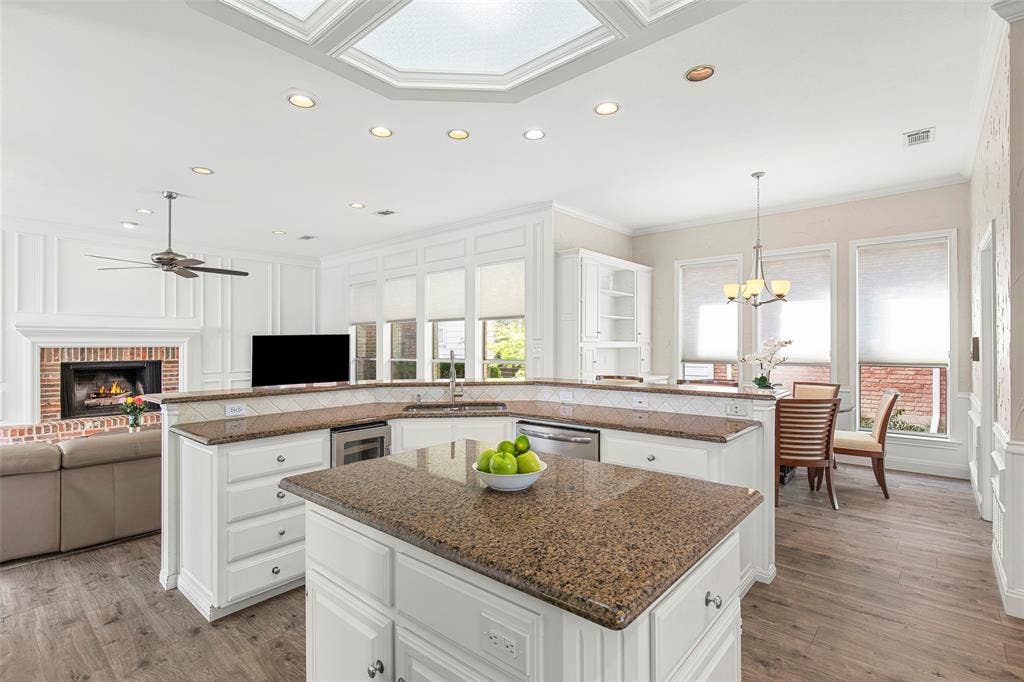 The kitchen opens to the breakfast area and family room, keeping the cook connected to conversation and everyday activities.