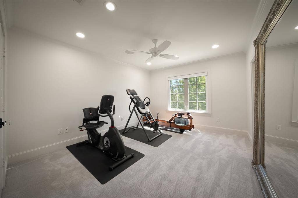 bedroom #2 of 4 upstairs staged as workout room