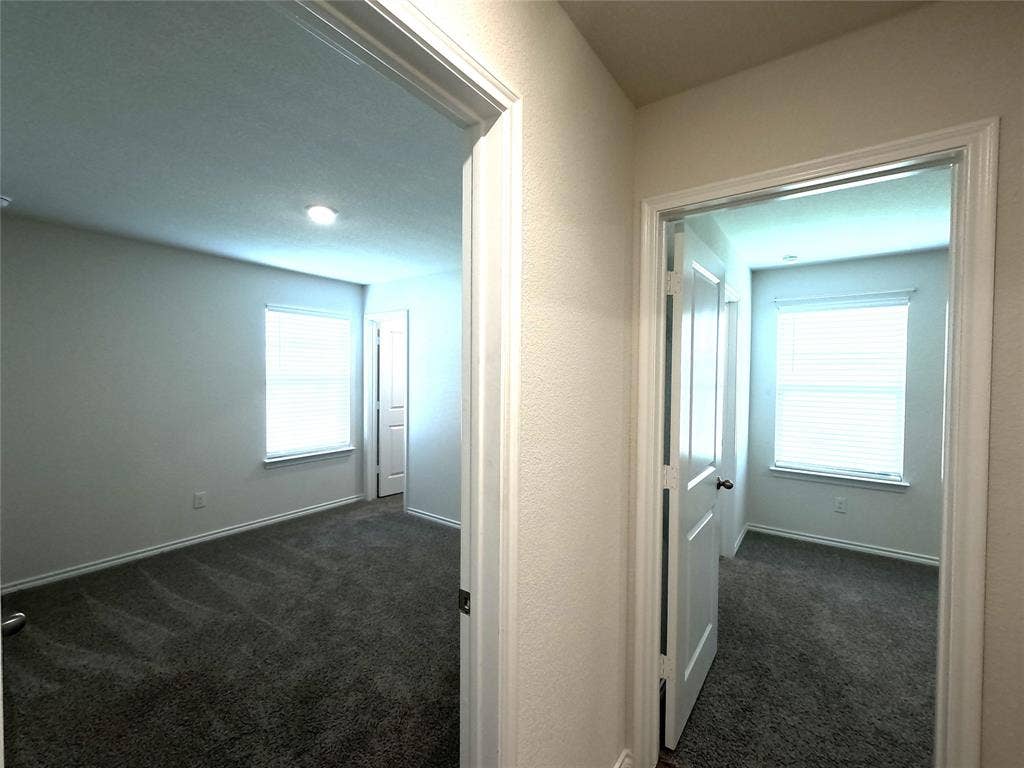 1148 Samantha Drive, Dallas, TX 75253 Two rooms featuring neutral wall tones, recessed lighting, and windows with blinds