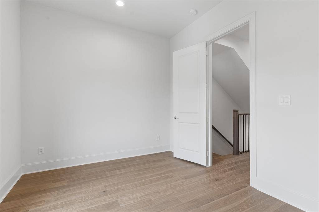 2401 Canton Street, #1002, Dallas, TX 75201 Third floor guest bedroom. Third floor guest bedroom features an ensuite bathroom.