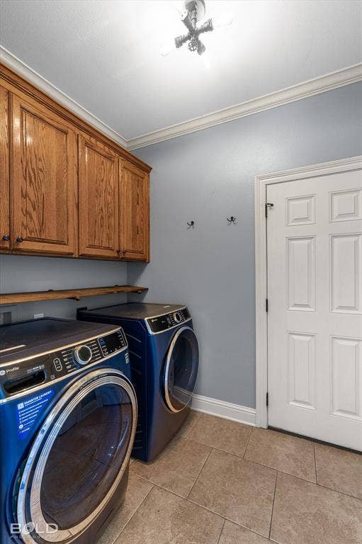 Utility area featuring wood cabinetry, overhead shelving, tile flooring, and a multi-panel door