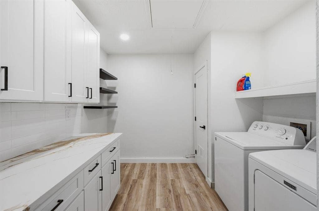 203 Evelyn Street, DeSoto, TX 75115 So much storage in this well-appointed laundry room! Pretty quartz countertops.