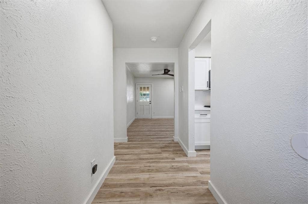203 Evelyn Street, DeSoto, TX 75115 Entry hall with kitchen to the right