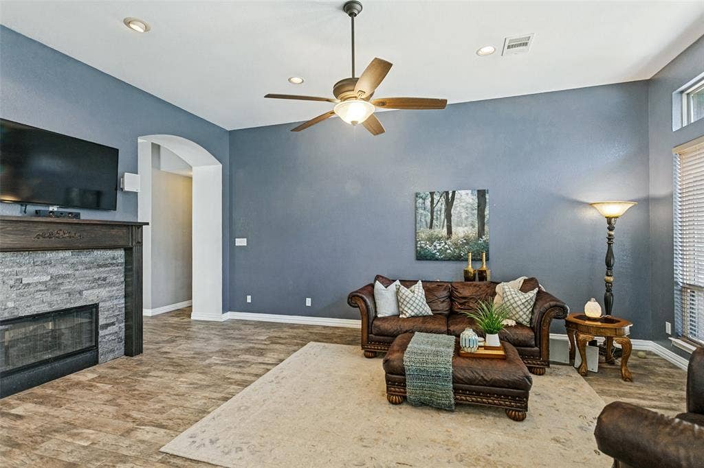Living room with see-thru gas fireplace.