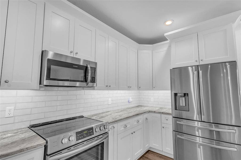 239 Colonial Drive, Mabank, TX 75156 Gracious storage and workspace worthy of a master chef with undercabinet lighting