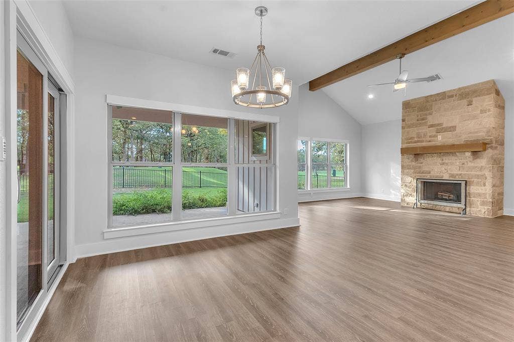 239 Colonial Drive, Mabank, TX 75156 Doors to the left open onto the covered porch which has a nook perfect for outdoor dining with a view