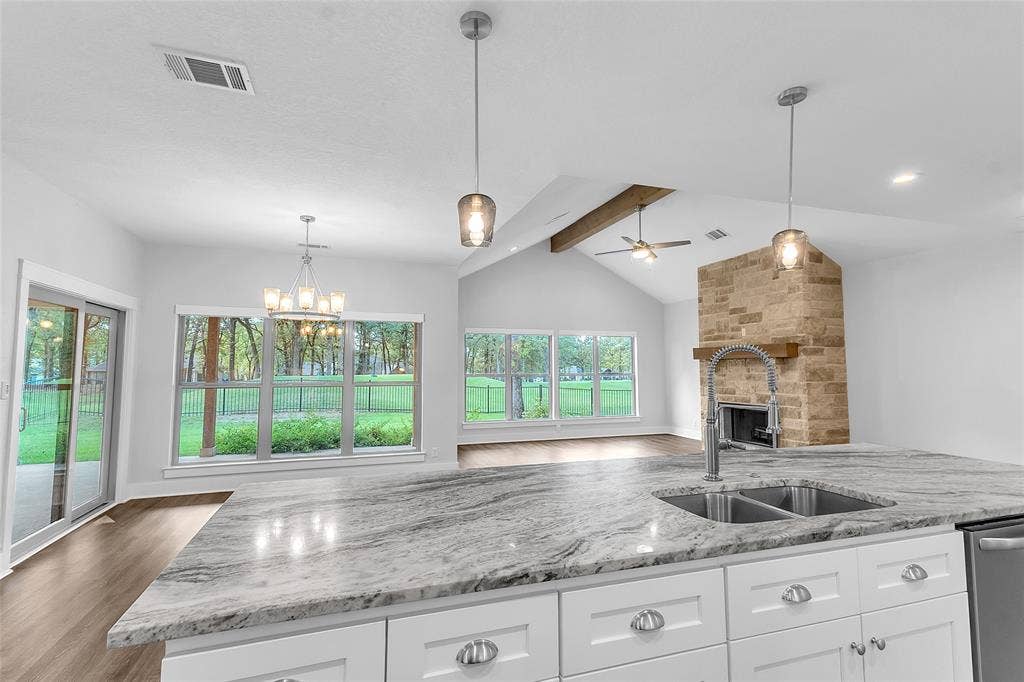 239 Colonial Drive, Mabank, TX 75156 Large granite topped Island adds tons of storage, extra seating for guests and ample countertop work space