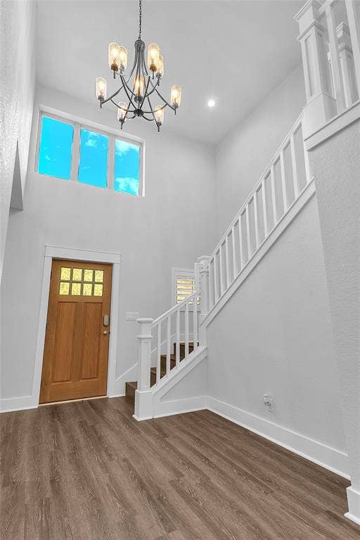 239 Colonial Drive, Mabank, TX 75156 Welcoming entry has tall ceilings and custom staircase to the media room