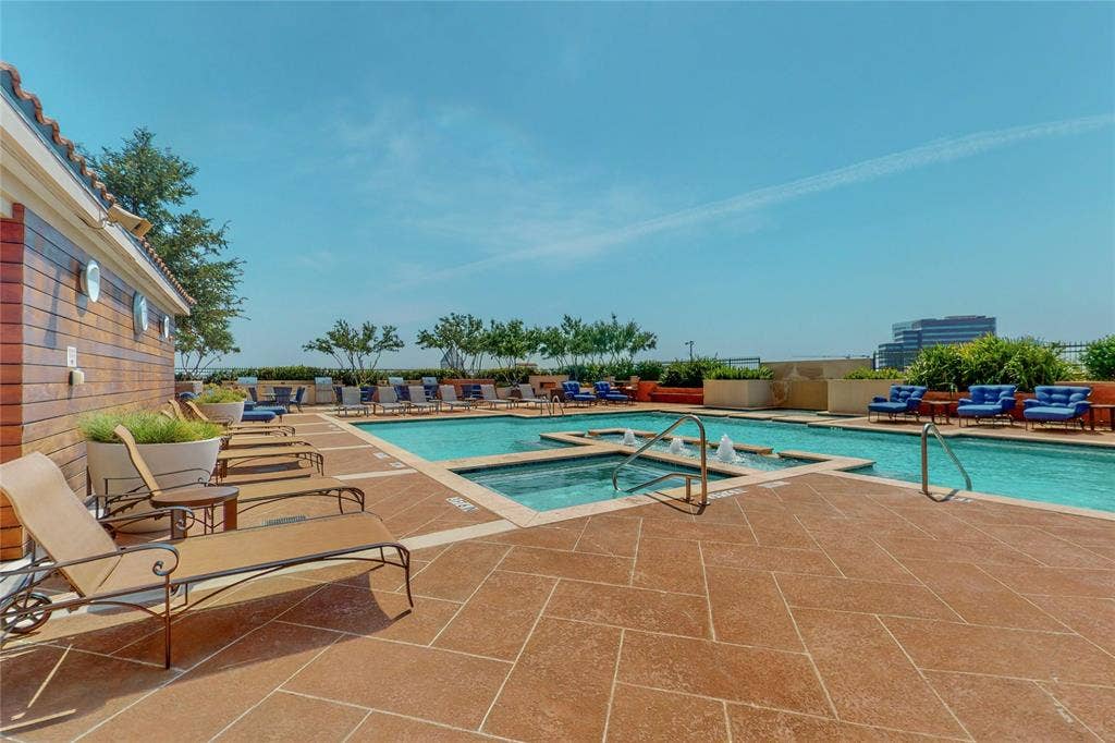 330 Las Colinas Boulevard E, #920, Irving, TX 75039 View of pool featuring a community hot tub and a patio area