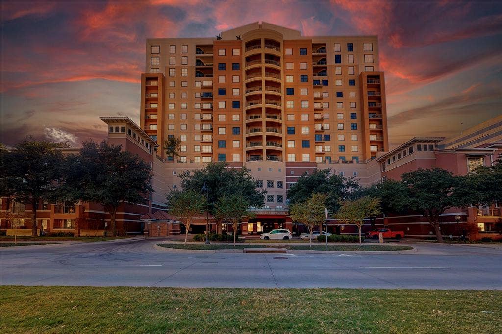 330 Las Colinas Boulevard E, #920, Irving, TX 75039 View of outdoor building at dusk