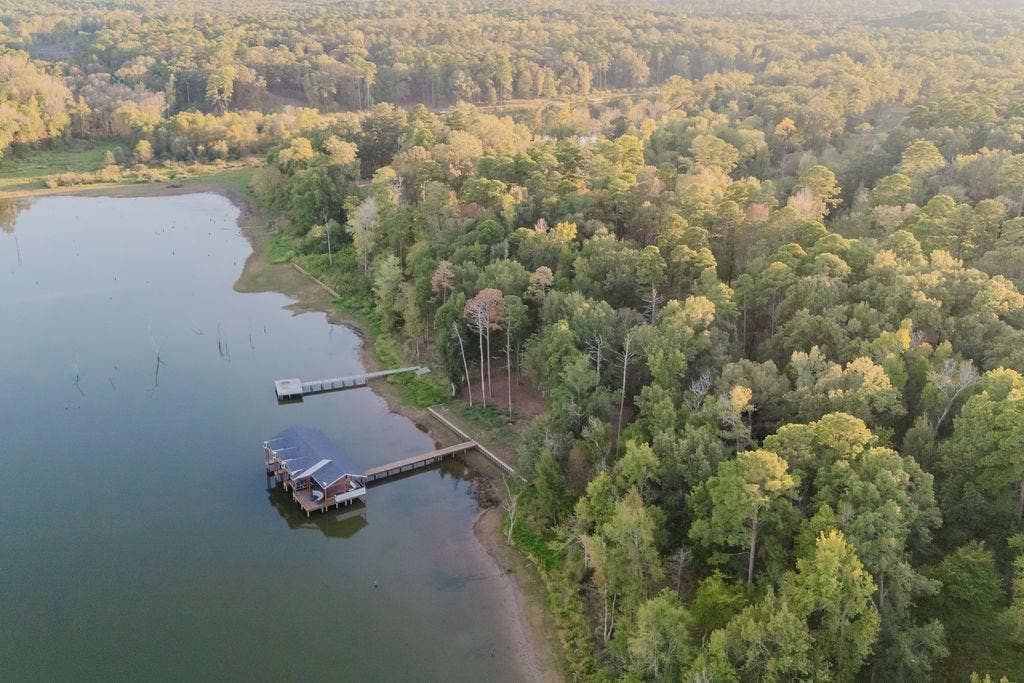 TBD Private Road 52416 Road, Leesburg, TX 75451 Waterfront property featuring a private boat house, two private docks, and mature tree coverage