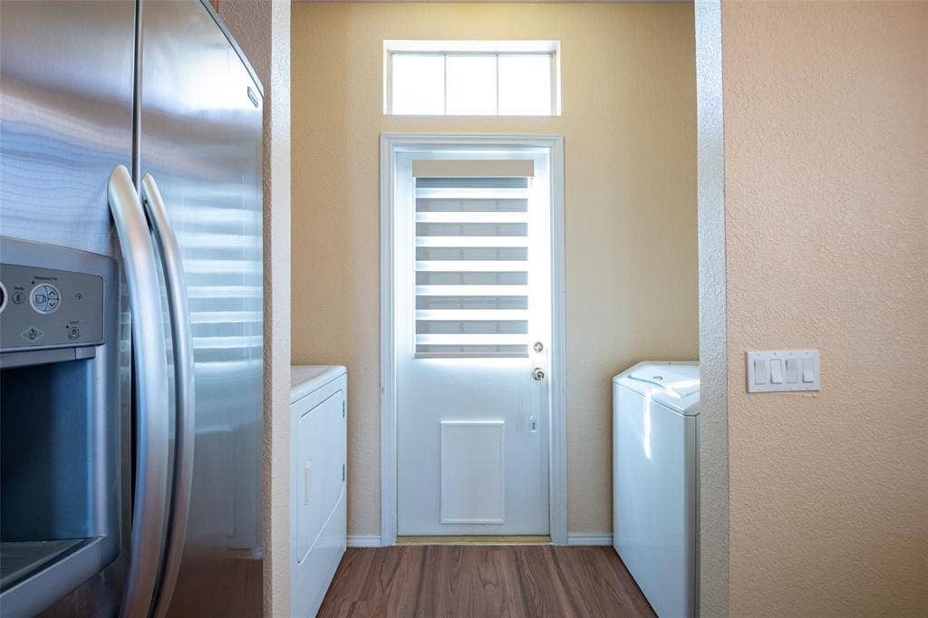 Wood-finish flooring with a light-colored wall finish