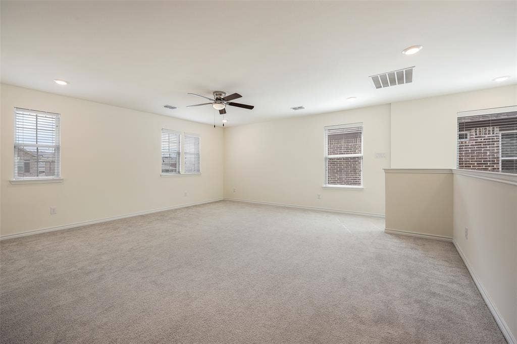 3681 Keechi Creek Drive, Celina, TX 75078 Neutral interior featuring wall-to-wall carpeting, multiple windows, recessed lighting, and a ceiling fan