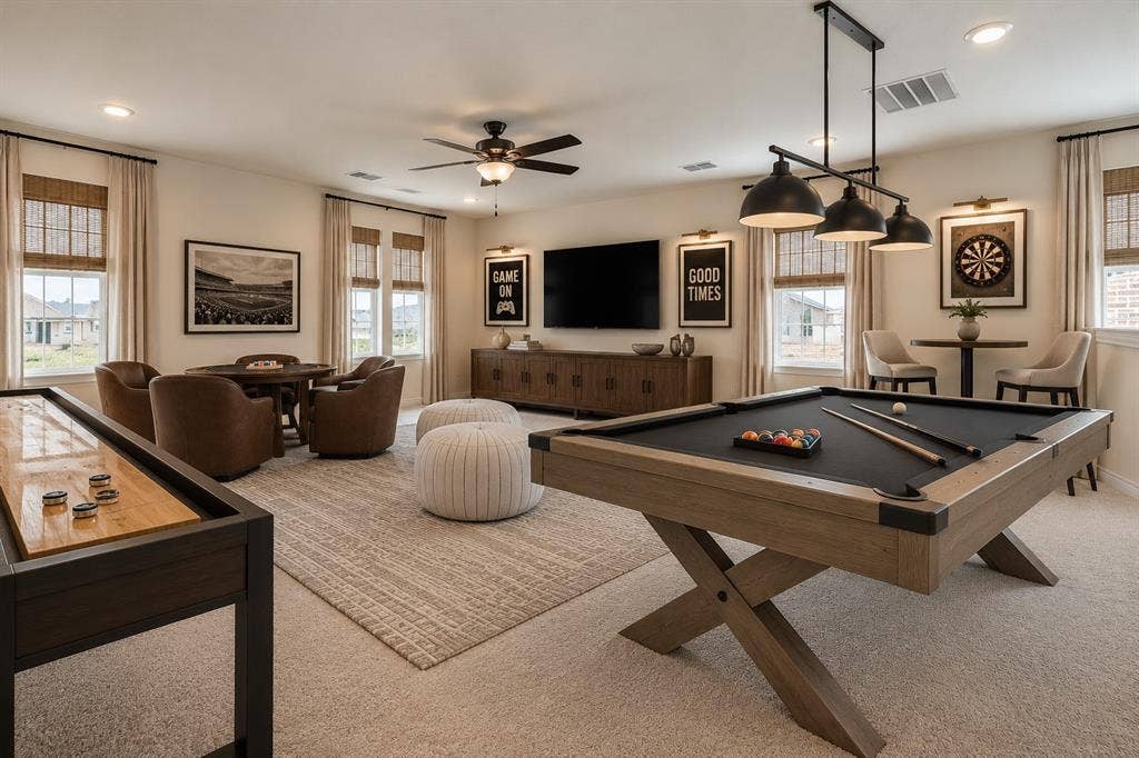 3681 Keechi Creek Drive, Celina, TX 75078 Virtually staged. Spacious recreation area featuring neutral wall-to-wall carpeting, recessed ceiling lighting, a multi-light metal pendant fixture, and a centralized ceiling fan