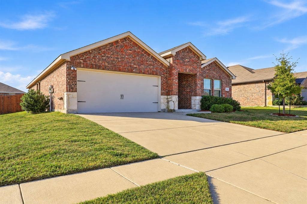 2316 French Street, Fate, TX 75189 Beautiful Brick and Stone Home in Woodcreek!