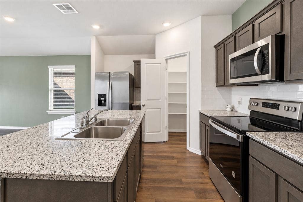 2316 French Street, Fate, TX 75189 Note the large walk-in pantry!!