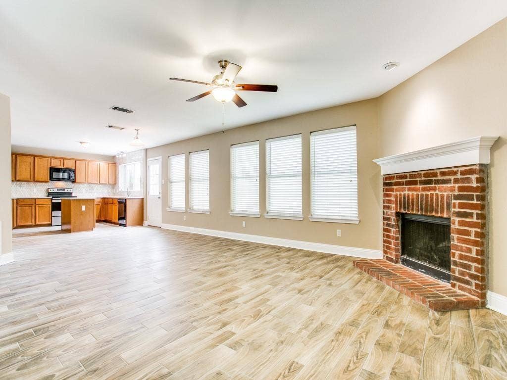 VIEW OF FAMILY ROOM AND KITCHEN!
