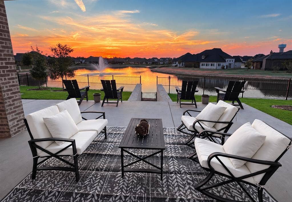 6651 Pinehurst Drive, Granbury, TX 76049 Spacious concrete patio with brick column detail