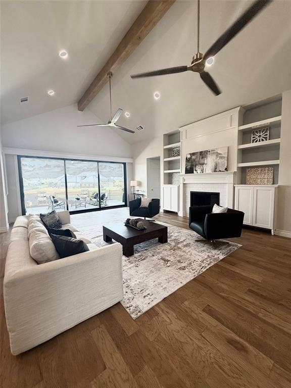 6651 Pinehurst Drive, Granbury, TX 76049 Vaulted ceiling with exposed wood beam, recessed lighting, and wood-finish flooring