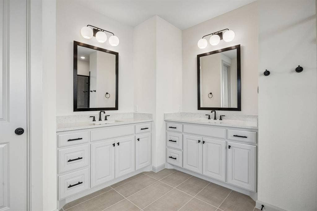 2444 Aurora Avenue, Celina, TX 75009 You'll enjoy separate his and hers vanities in this wonderful owner's bath!