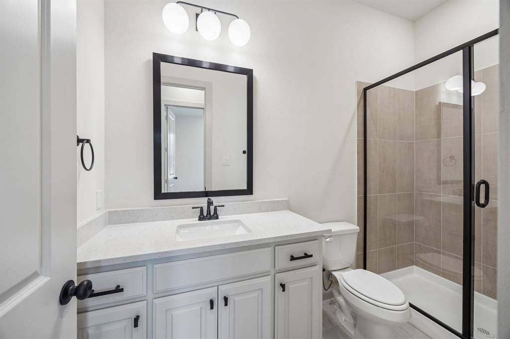 2444 Aurora Avenue, Celina, TX 75009 Friends and family will feel right at home in any of the beautifully finished guest baths our Frederic II plan has to offer.