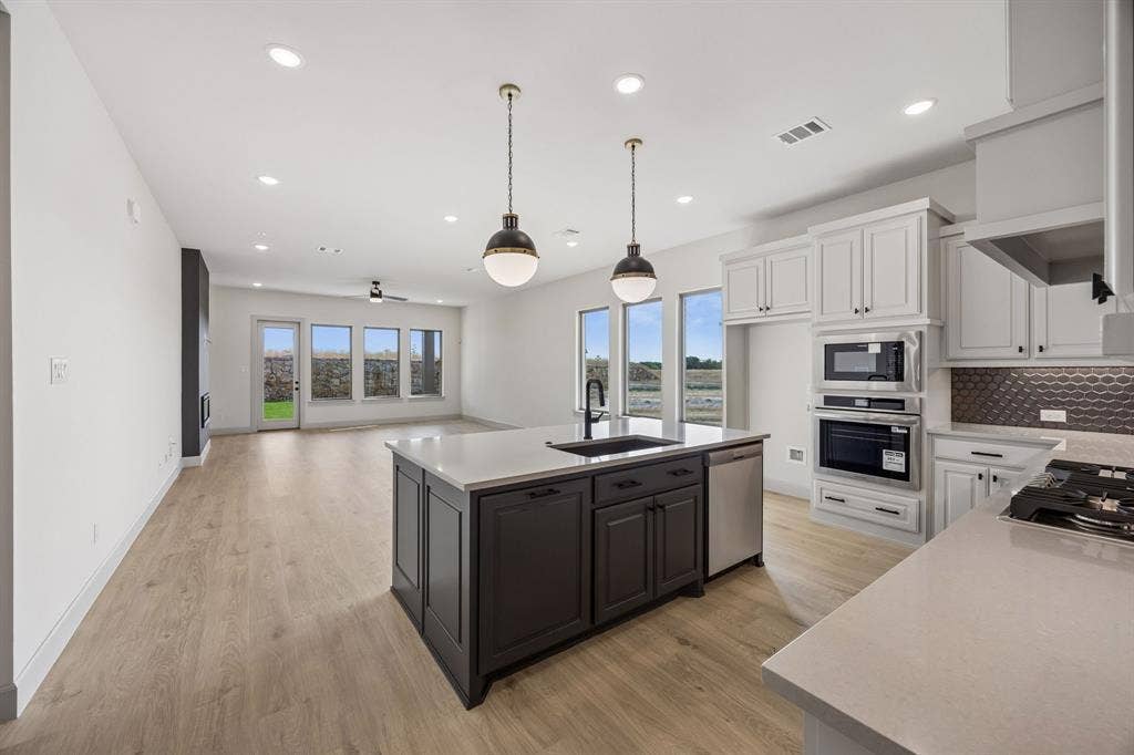 2444 Aurora Avenue, Celina, TX 75009 The chef in the family will never be left out of the party in this fantastic open concept floor plan!