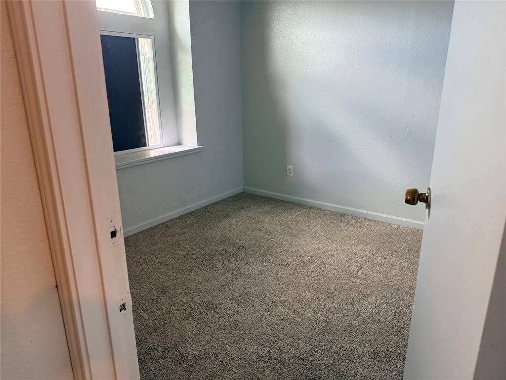 1644 Taylorcrest Drive, Dallas, TX 75253 Wall-to-wall carpeting, light-toned wall finish, and a window with a deep sill