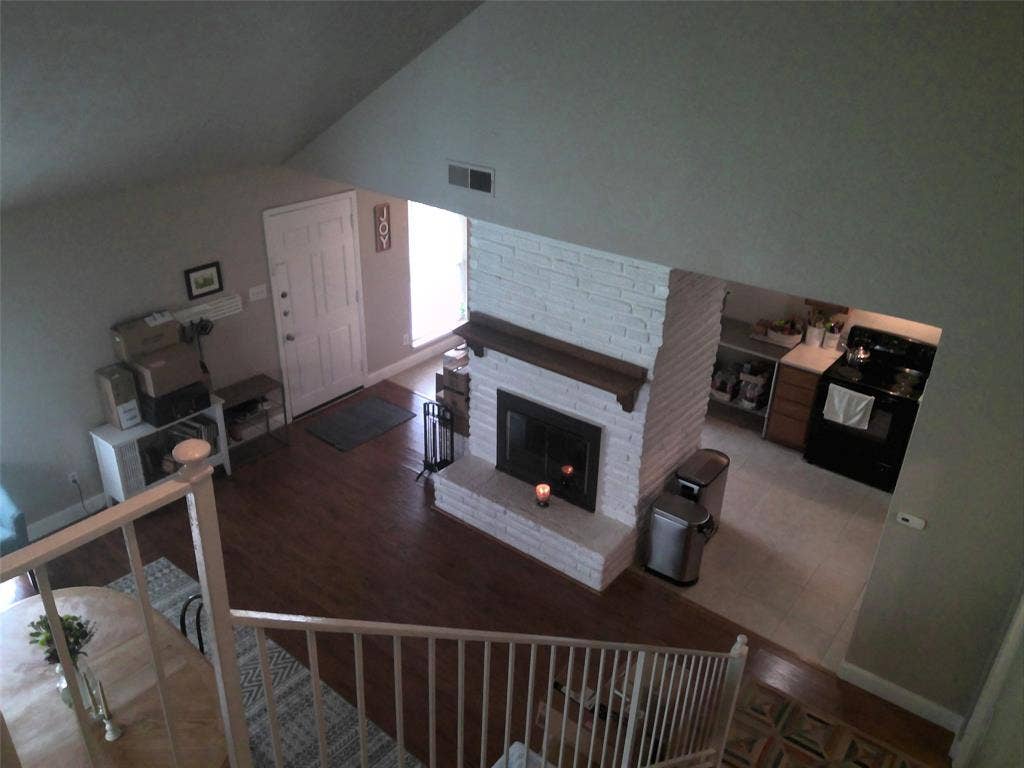 7348 Walling Lane, Dallas, TX 75231 Vaulted den ceiling. Upstairs has 2 large bedrooms and a full bath.