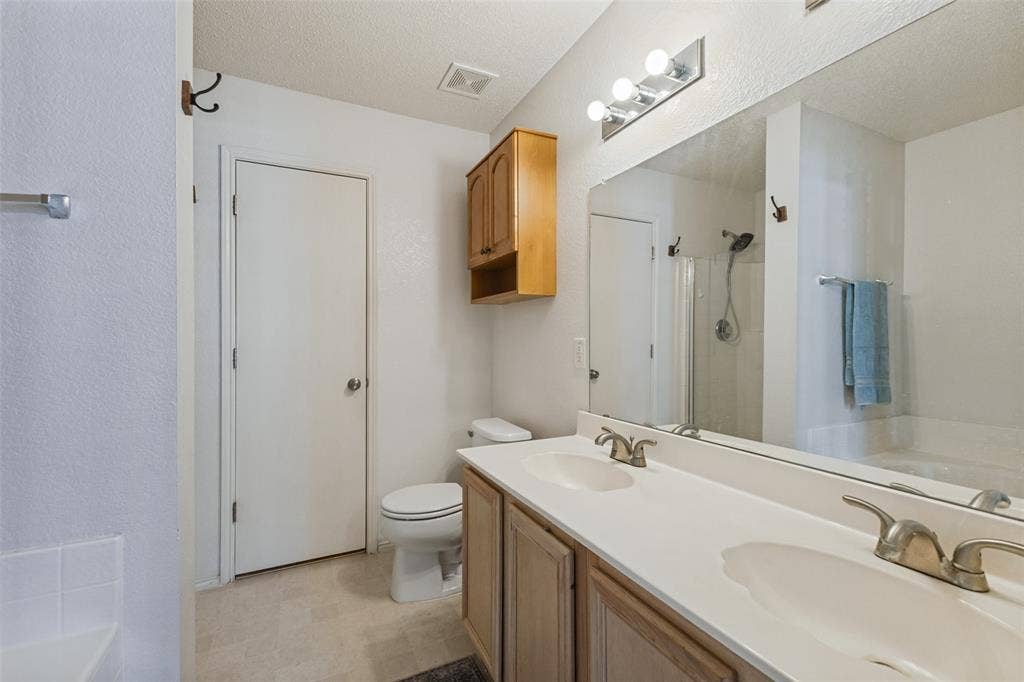Large walk in closet is behind the door
