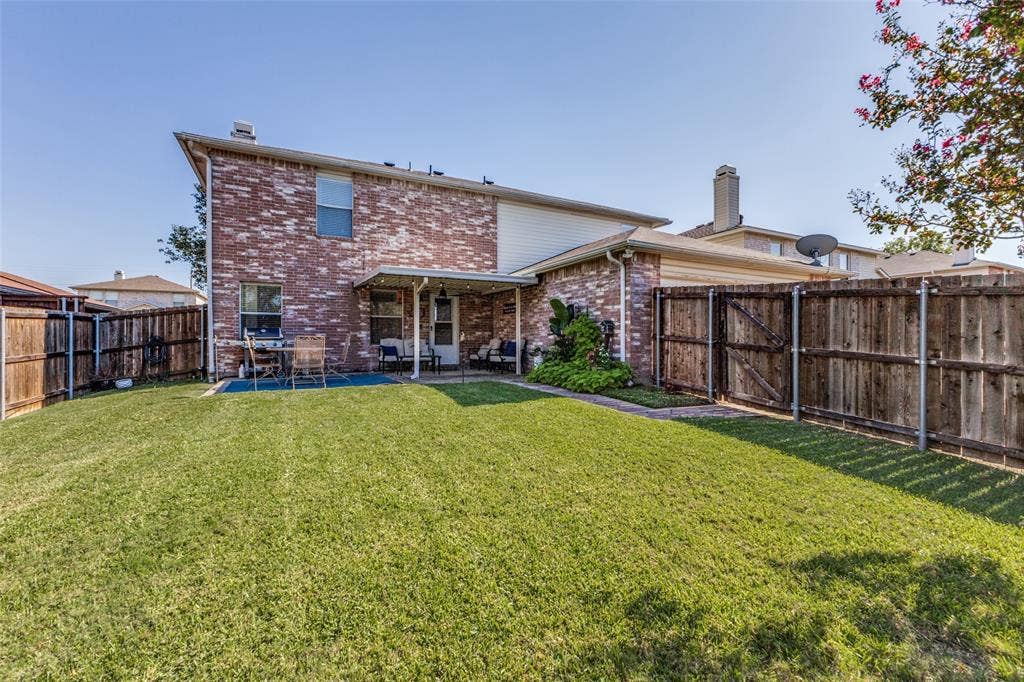 Beautiful backyard with wood privacy fence