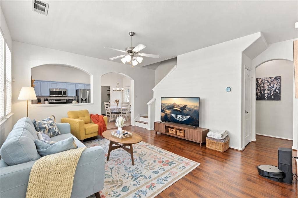 Hardwood-finish flooring, recessed lighting, and a ceiling fan with light kit