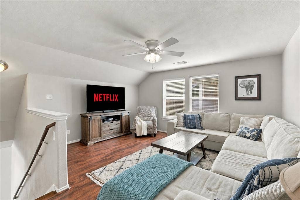 Second level family room that is huge! Great for families, secondary living, crafts, etc.