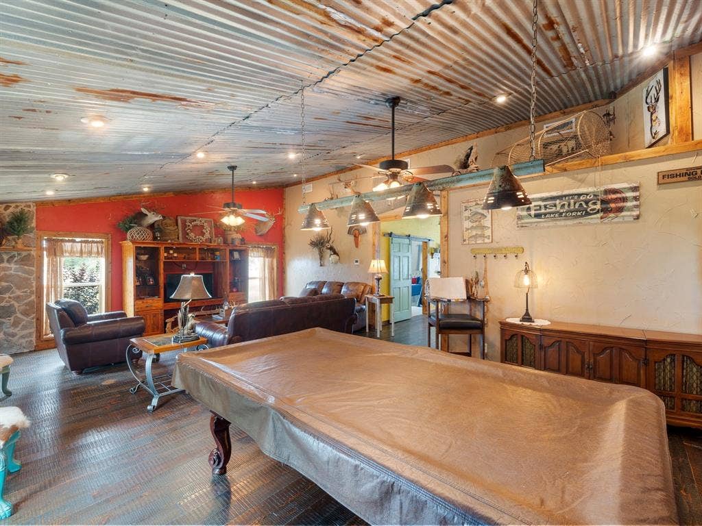 5801 County Road 4128, Scurry, TX 75158 Corrugated metal ceiling with recessed lighting and ceiling fans
