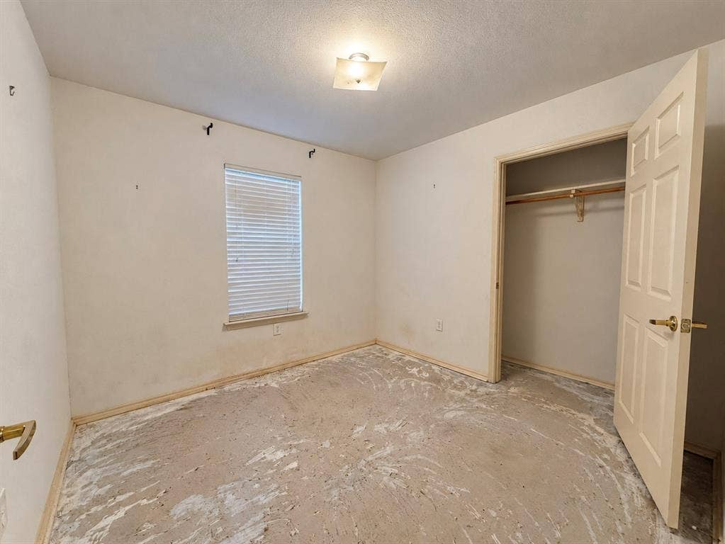 208 Olive Street, Lone Oak, TX 75453 Room with neutral wall tones and a window with blinds