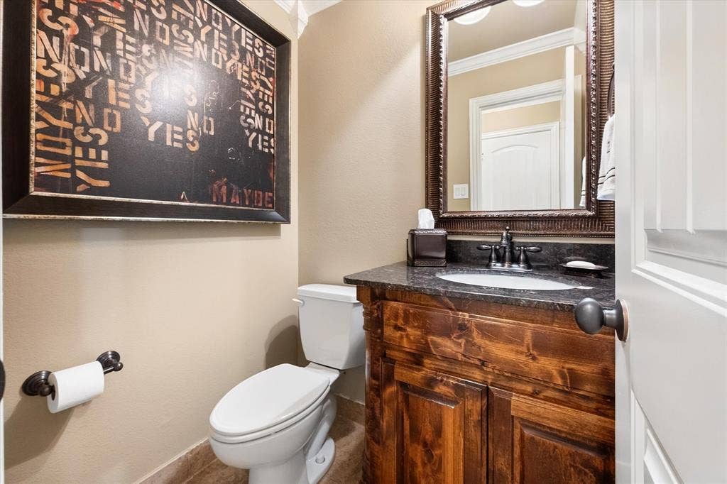824 Rio Grande Drive, Mansfield, TX 76063 Guest half bath downstairs.