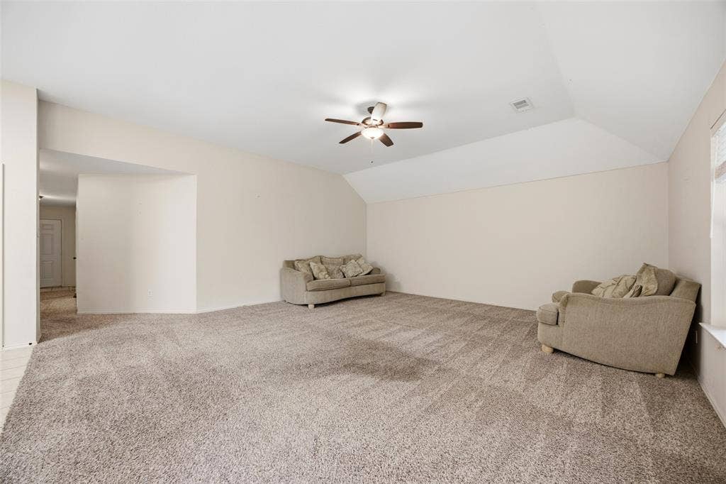 Large living room with tall ceiling
