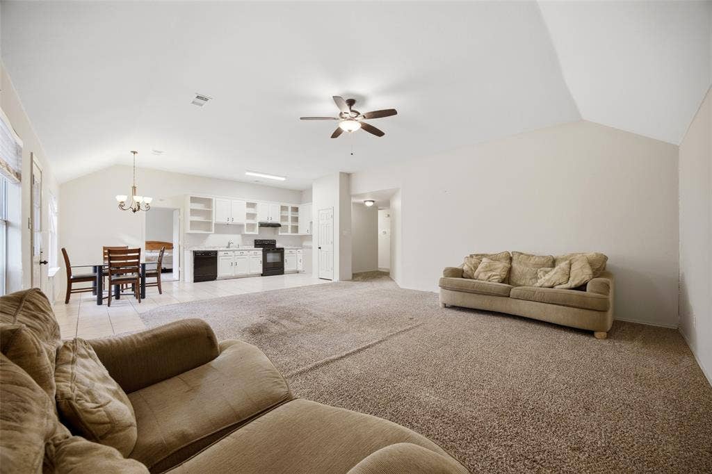 The living room is open to the kitchen