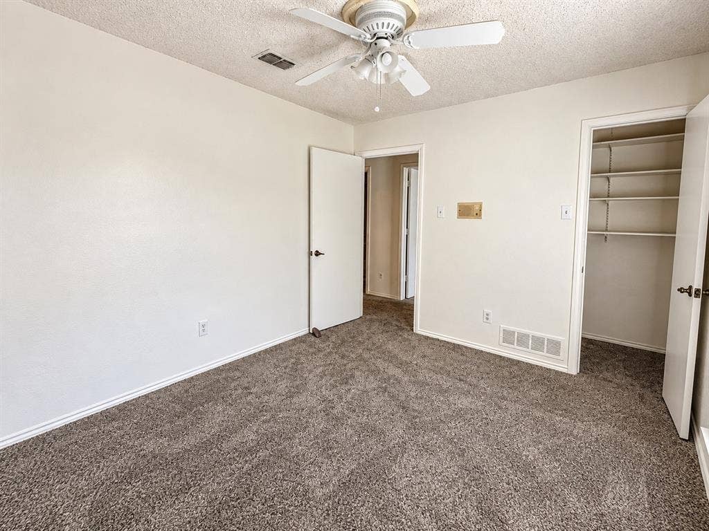1444 Marlene Place, DeSoto, TX 75115 Wall-to-wall carpeting and white walls