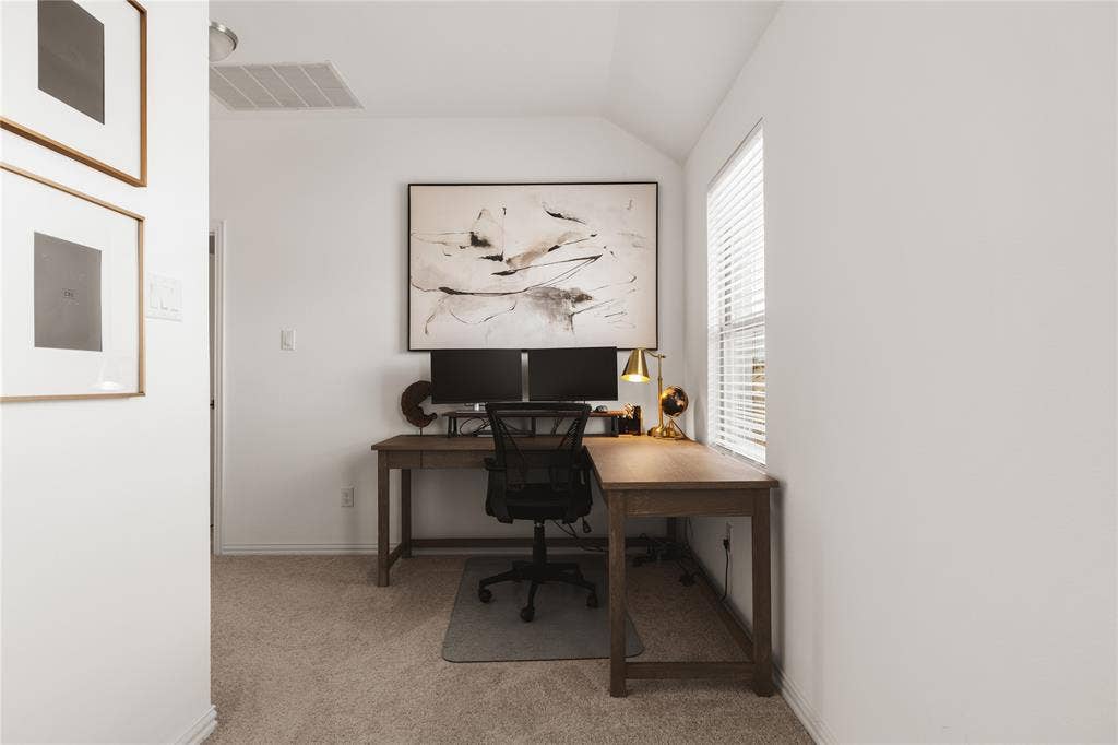 1456 Martingale Lane, Forney, TX 75126 Neutral interior space featuring carpeting and a window with horizontal blinds